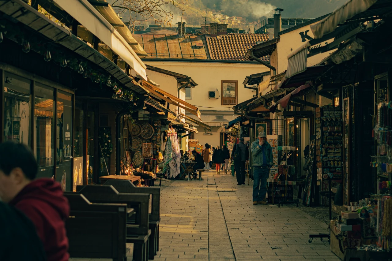 Narrow cobbled streets of Baščaršija, Sarajevo's historic Ottoman-era bazaar, lined with shops and cafés